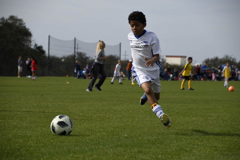 Kid Playing Soccer